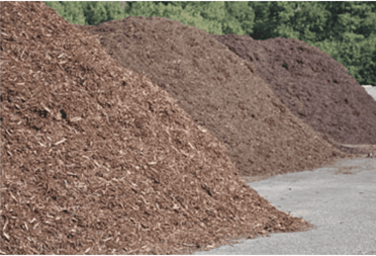 wholesale mulch in piles by color and ready for delivery